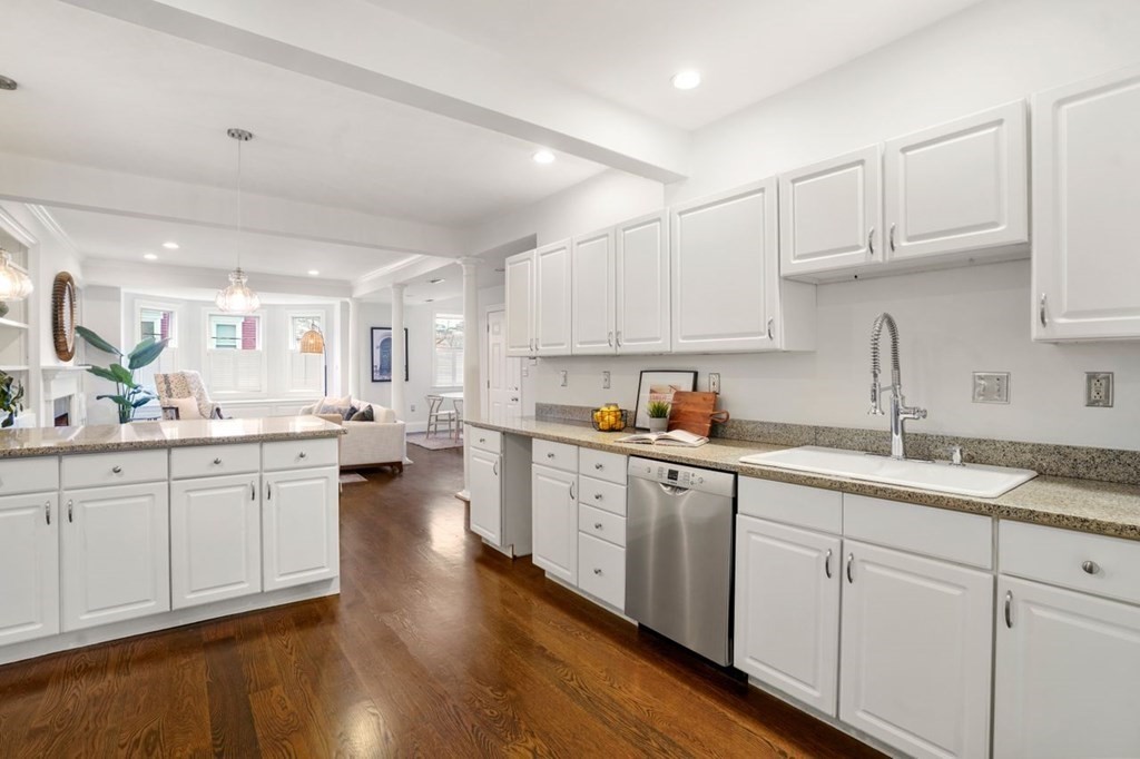 11 Union Street, Unit 2 Boston, MA 02129 - Photo 4 of 22 a kitchen with sink stove and cabinets