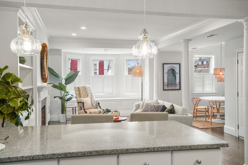 11 Union Street, Unit 2 Boston, MA 02129 - Photo 7 of 22 a kitchen with granite countertop a sink and a counter top space