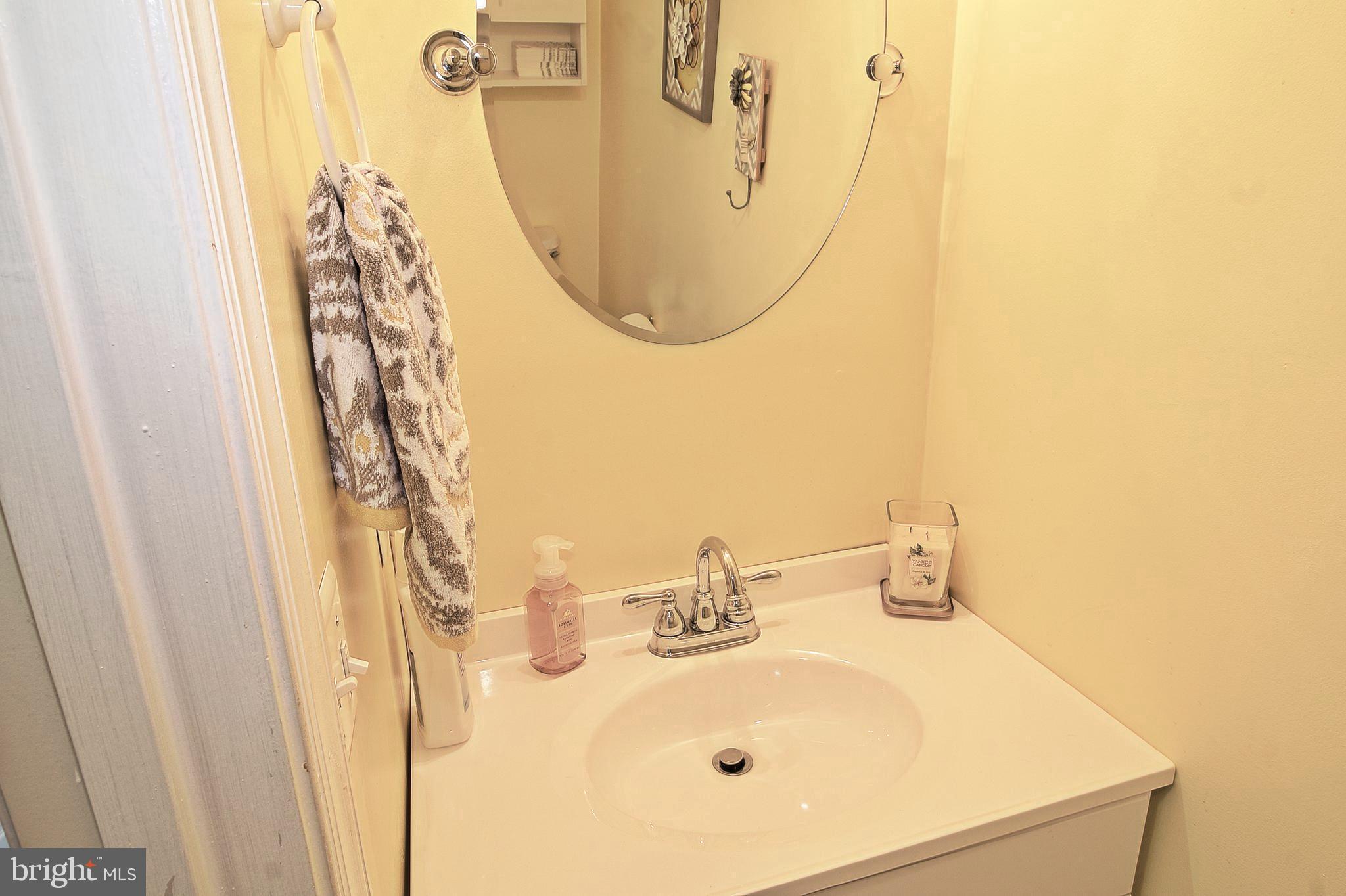 8532 Ellicott View Road Ellicott City, MD 21043 - Photo 14 of 54 Main floor half bath