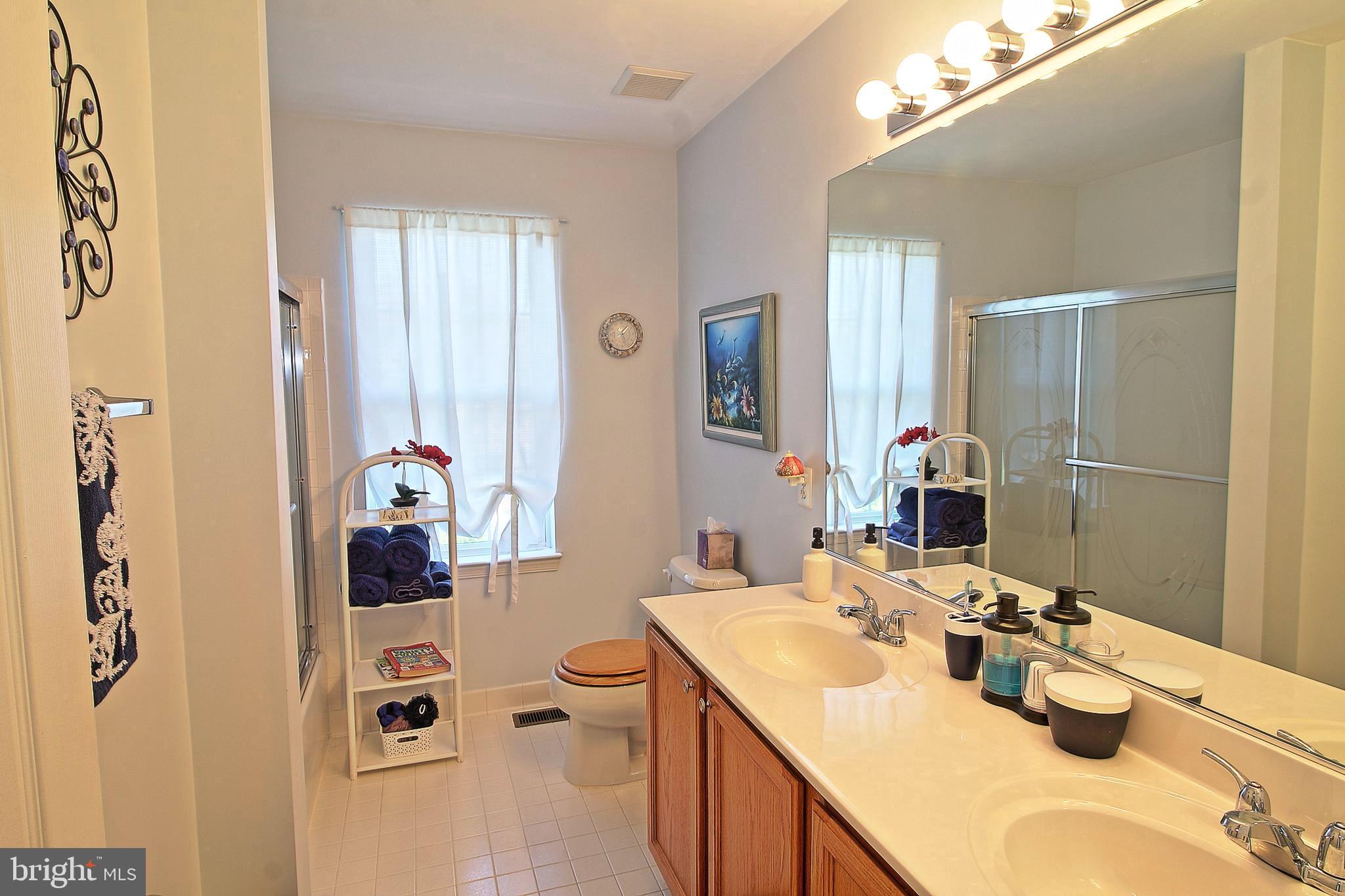 8532 Ellicott View Road Ellicott City, MD 21043 - Photo 35 of 54 Upper floor bathroom with dual vanity