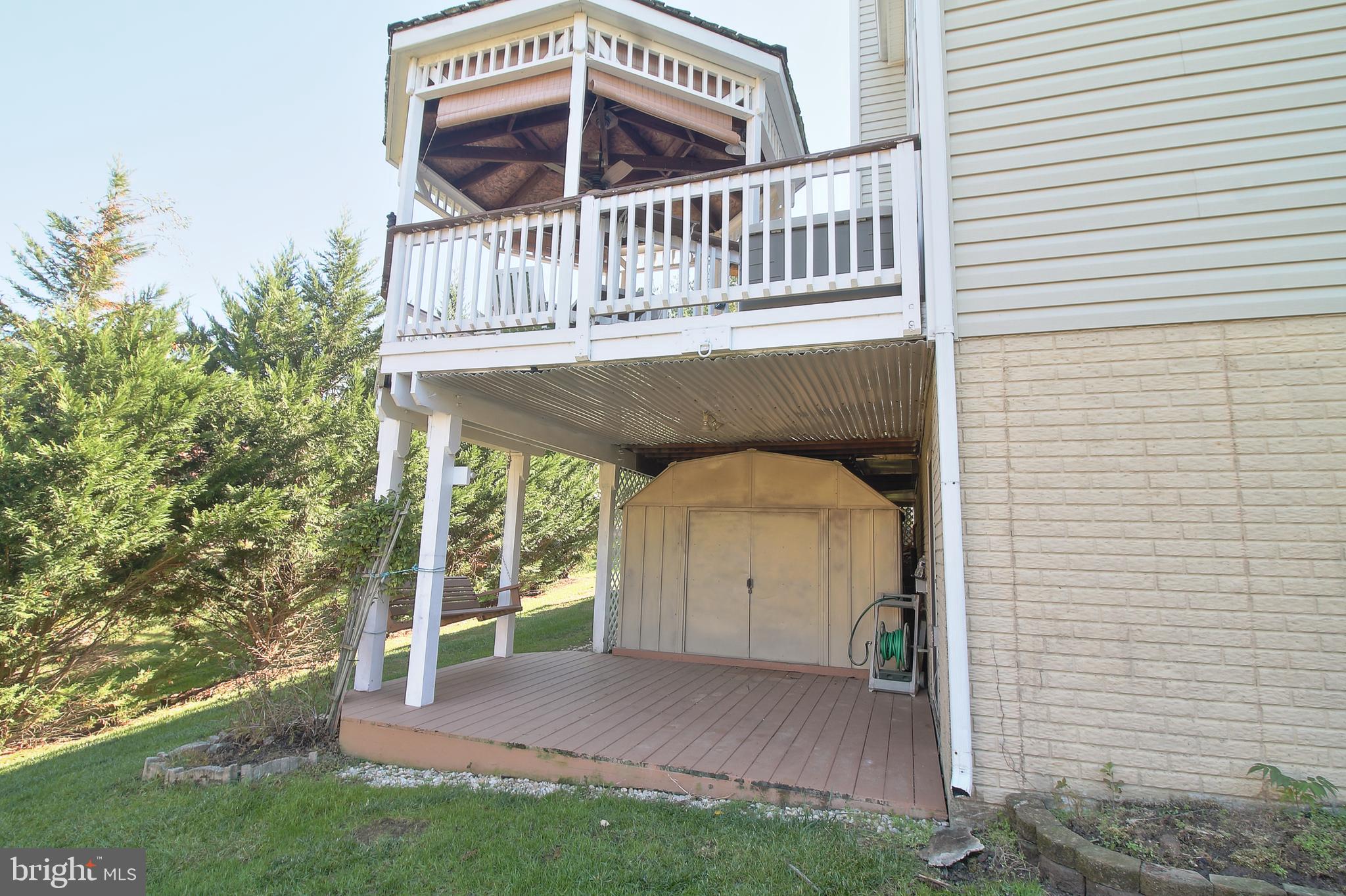 8532 Ellicott View Road Ellicott City, MD 21043 - Photo 50 of 54 Lower covered patio with shed