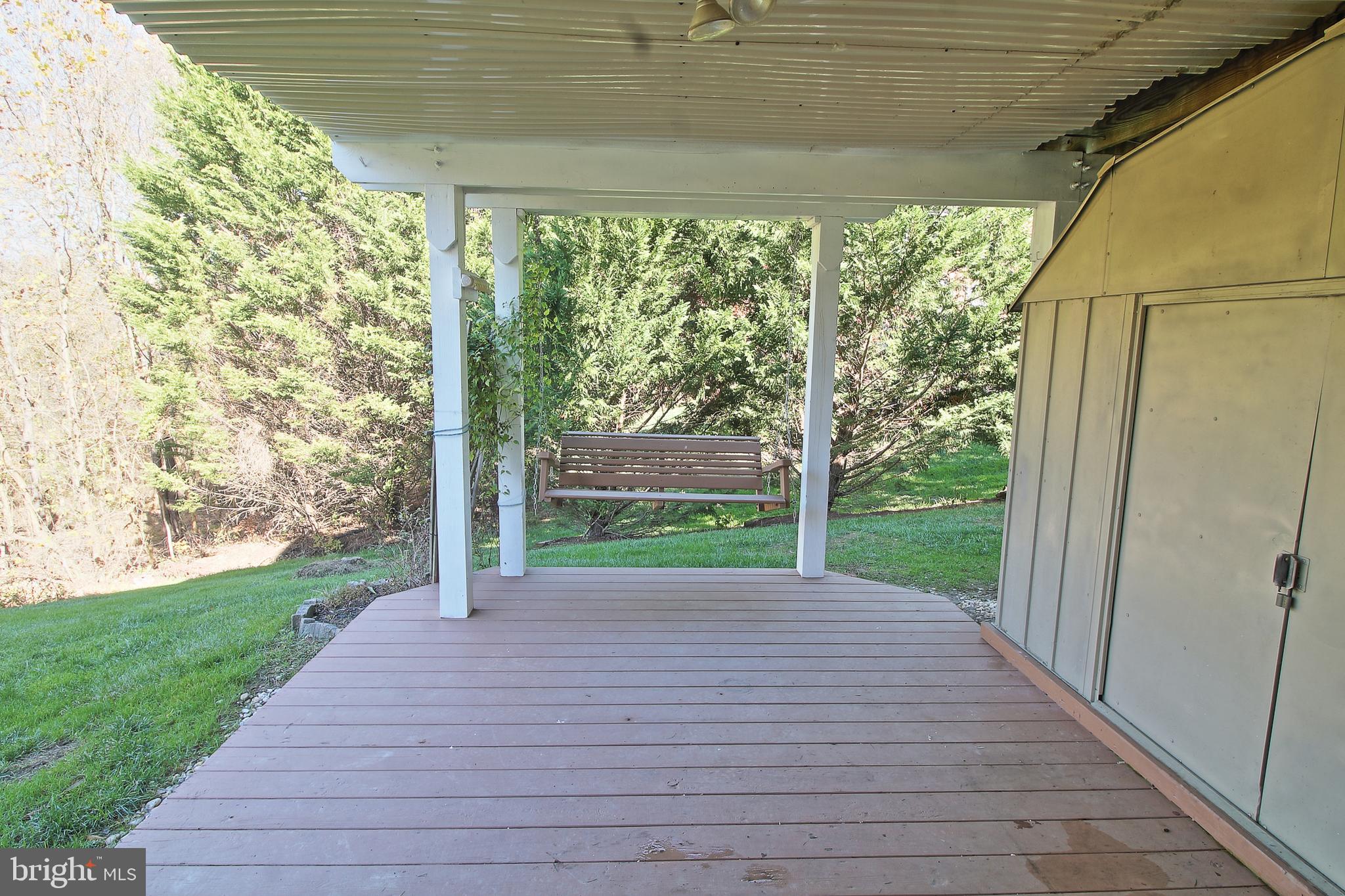 8532 Ellicott View Road Ellicott City, MD 21043 - Photo 51 of 54 Lower level walk-out to covered patio with shed