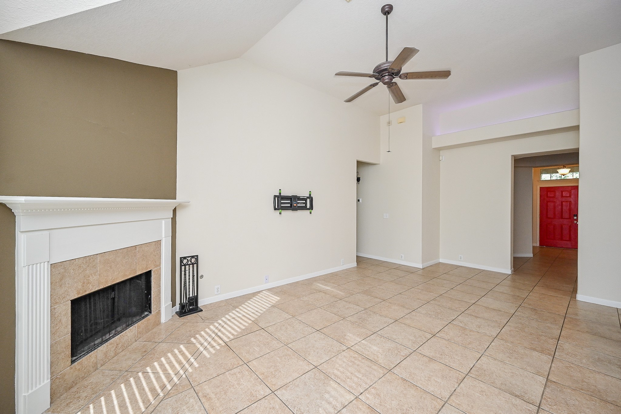2726 Redwick Drive Spring, TX 77388 - Photo 13 of 32 a view of an empty room with a fireplace