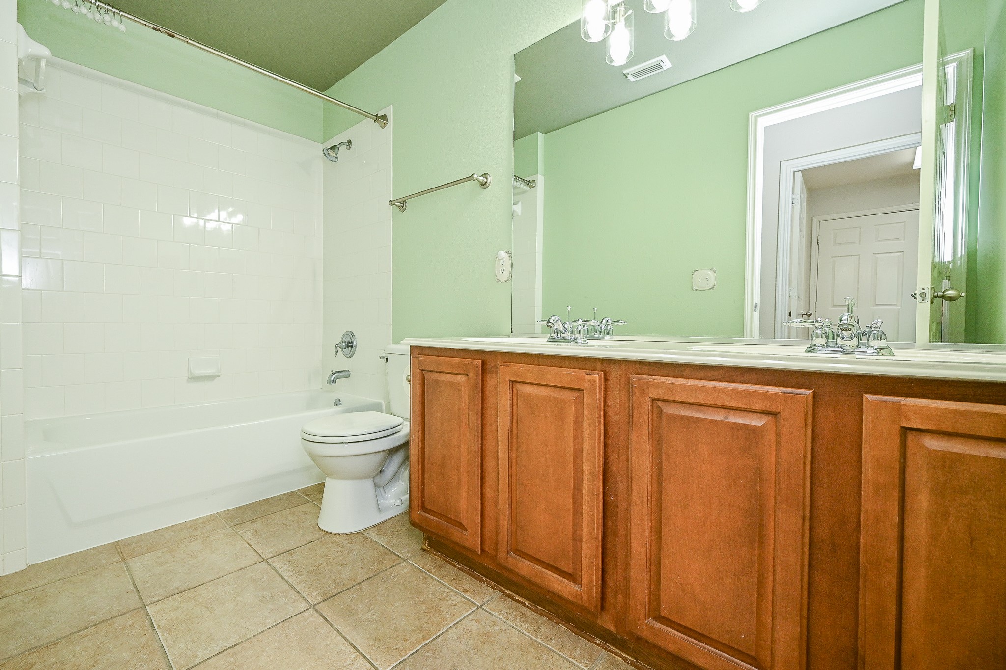 2726 Redwick Drive Spring, TX 77388 - Photo 20 of 32 a bathroom with a granite countertop sink toilet and shower
