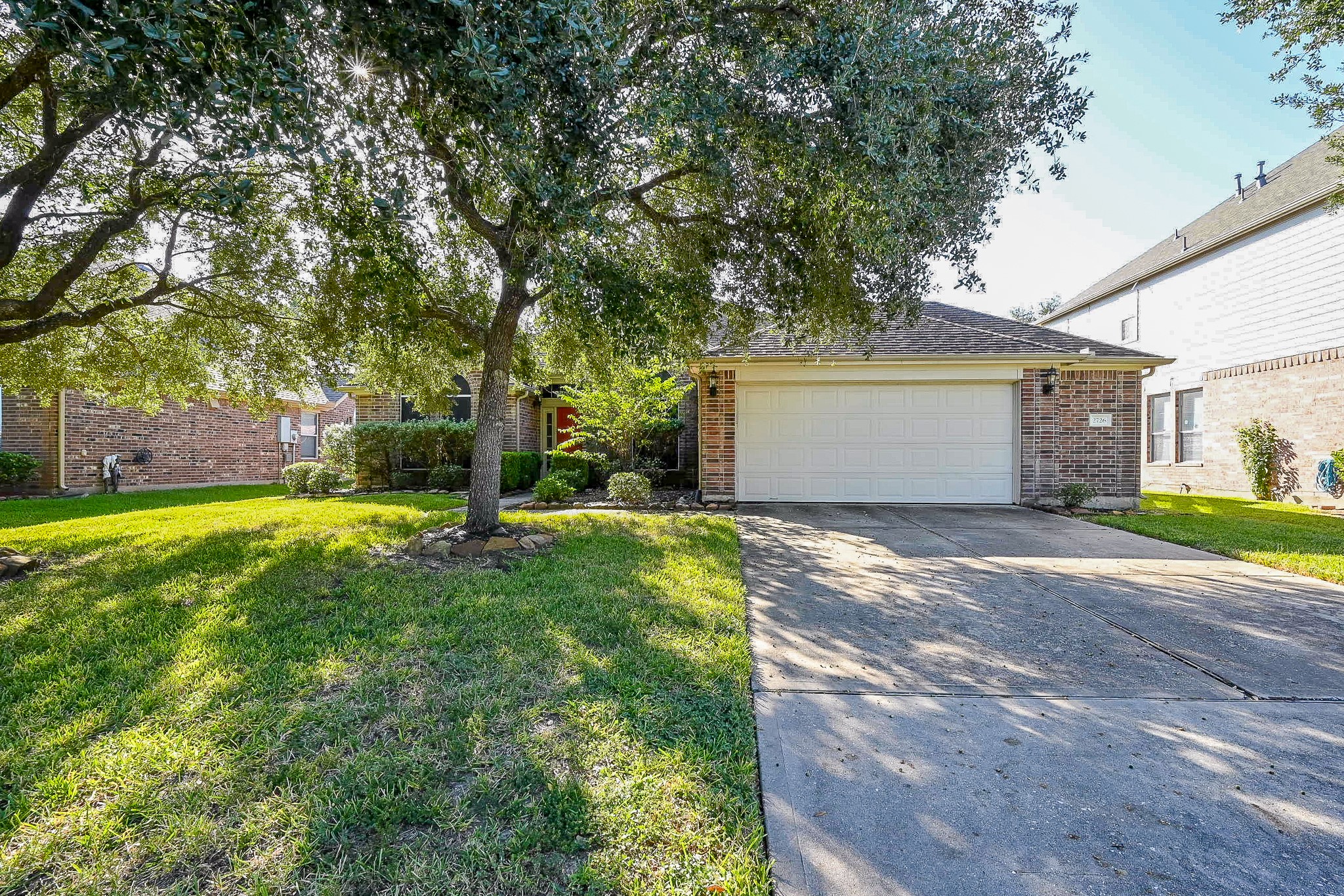 2726 Redwick Drive Spring, TX 77388 - Photo 2 of 32 a view of a house with backyard and a tree