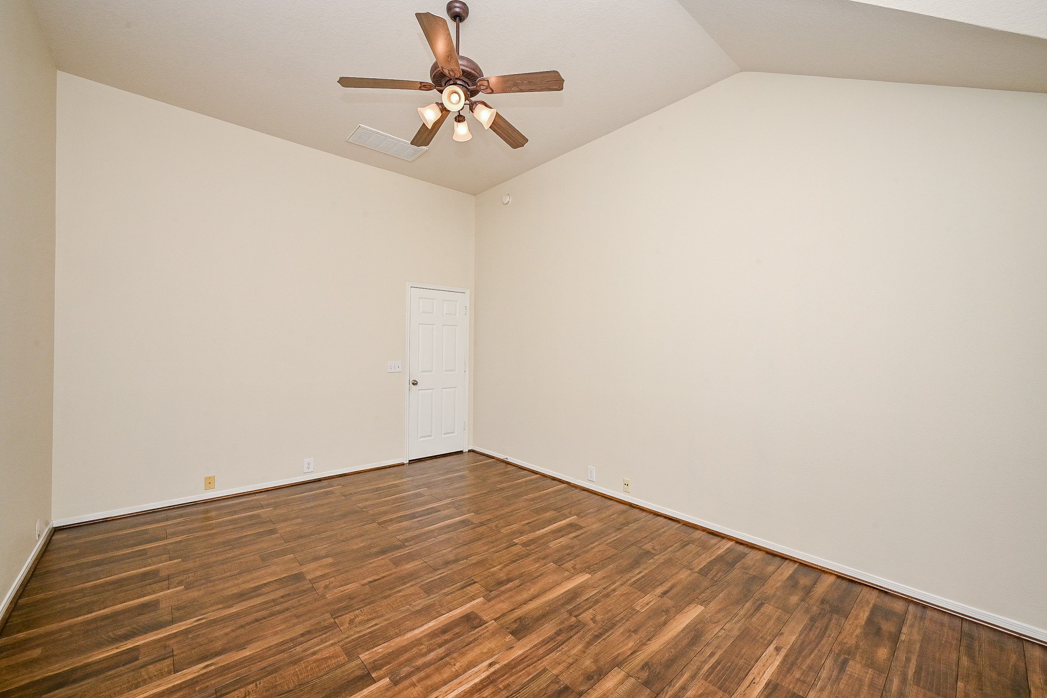 2726 Redwick Drive Spring, TX 77388 - Photo 24 of 32 a view of an empty room with wooden floor