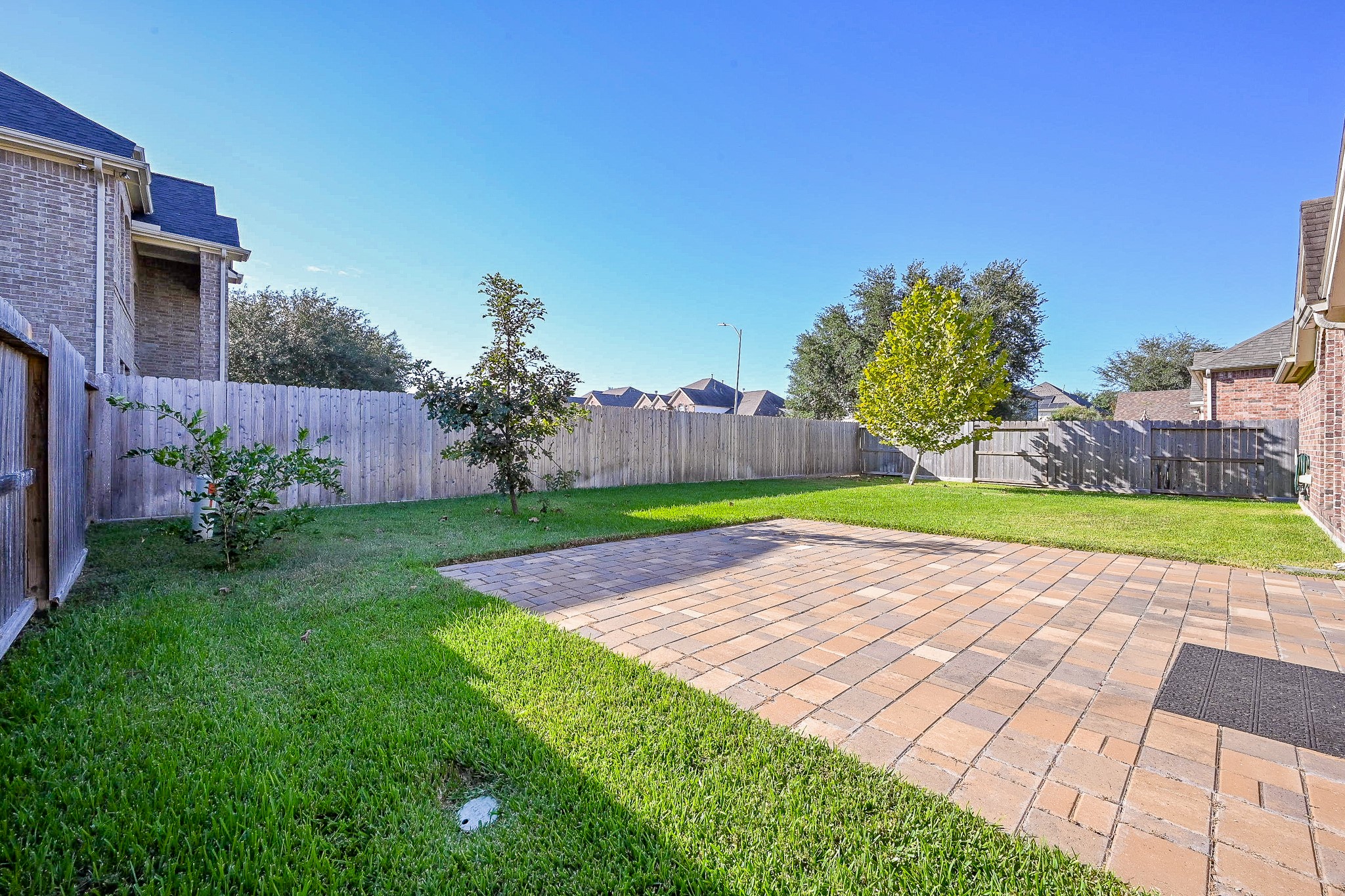 2726 Redwick Drive Spring, TX 77388 - Photo 31 of 32 a view of backyard with plants and outdoor seating