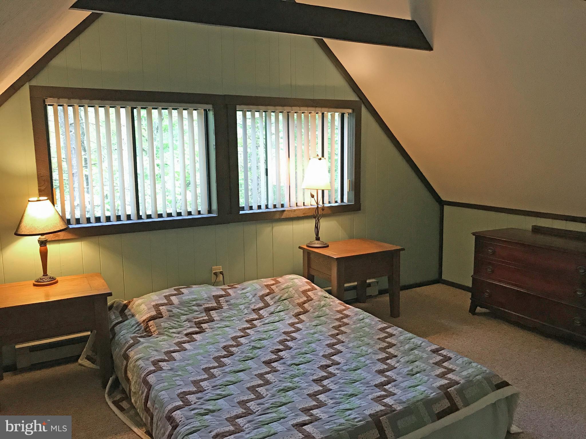 335 Connie Road Basye, VA 22810 - Photo 21 of 30 Loft Master Bedroom with beamed ceiling