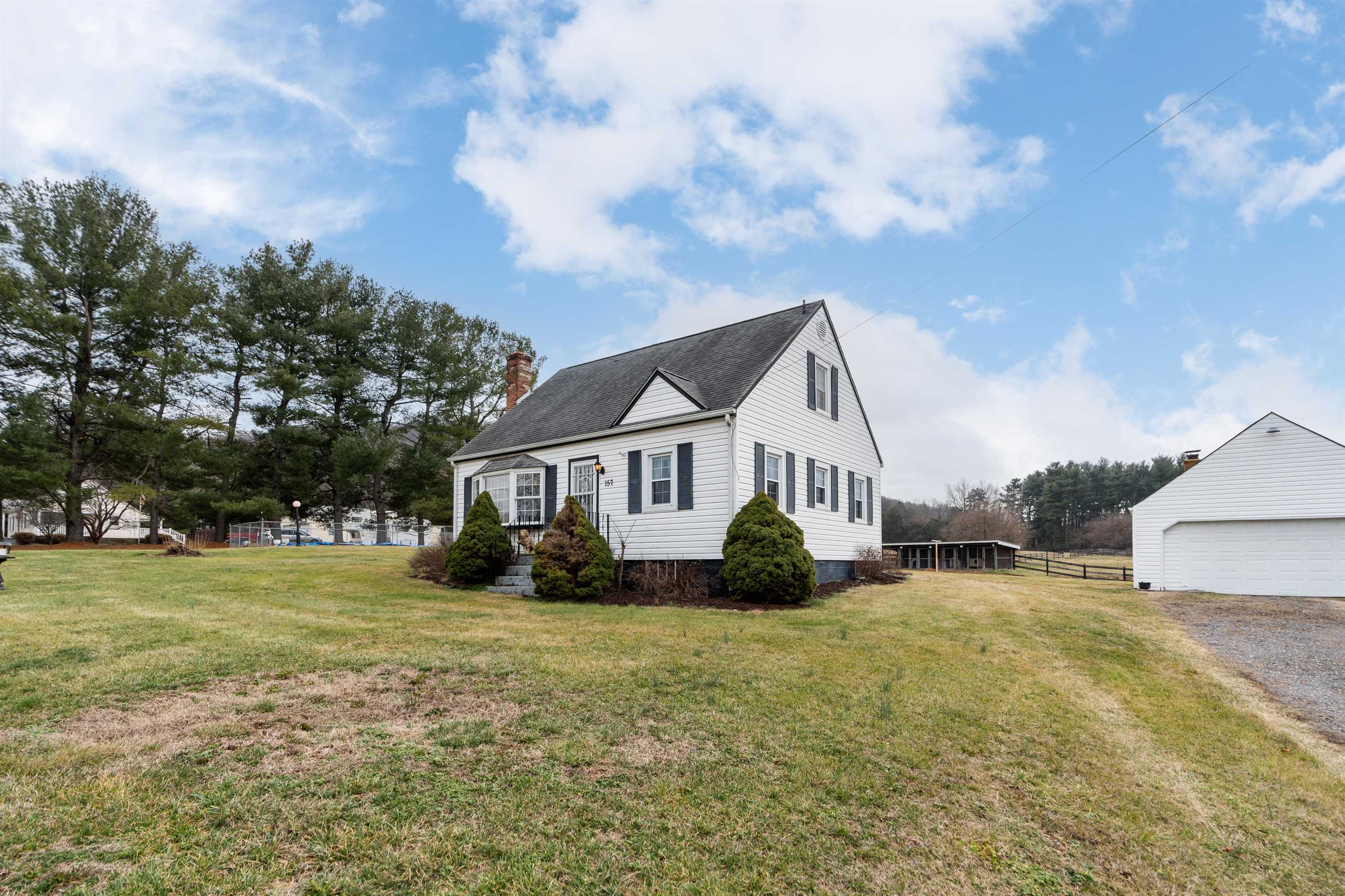 157 Humbert Road Crimora, VA 24431 - Photo 3 of 59 a view of a house with a big yard and large trees