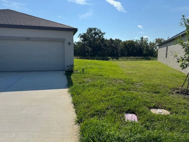 a house view with a garden space