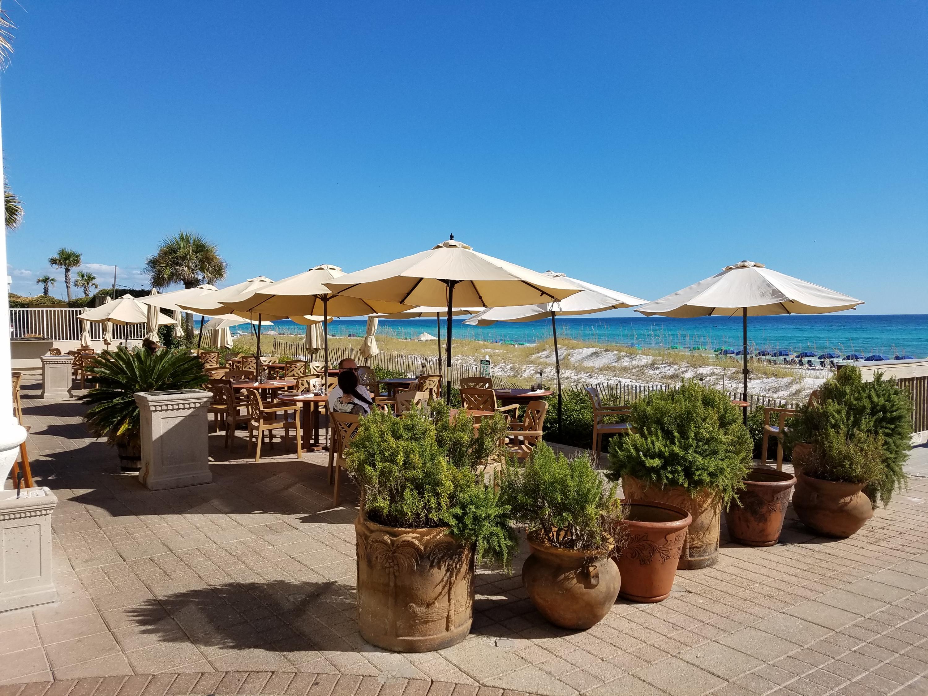 4507 Luke Avenue Destin, FL 32541 - Photo 4 of 8 a view of a patio with chairs and plants