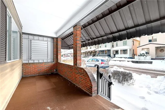 a balcony with wooden floor