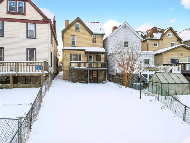 a picture of a bathroom with a sink and mirror