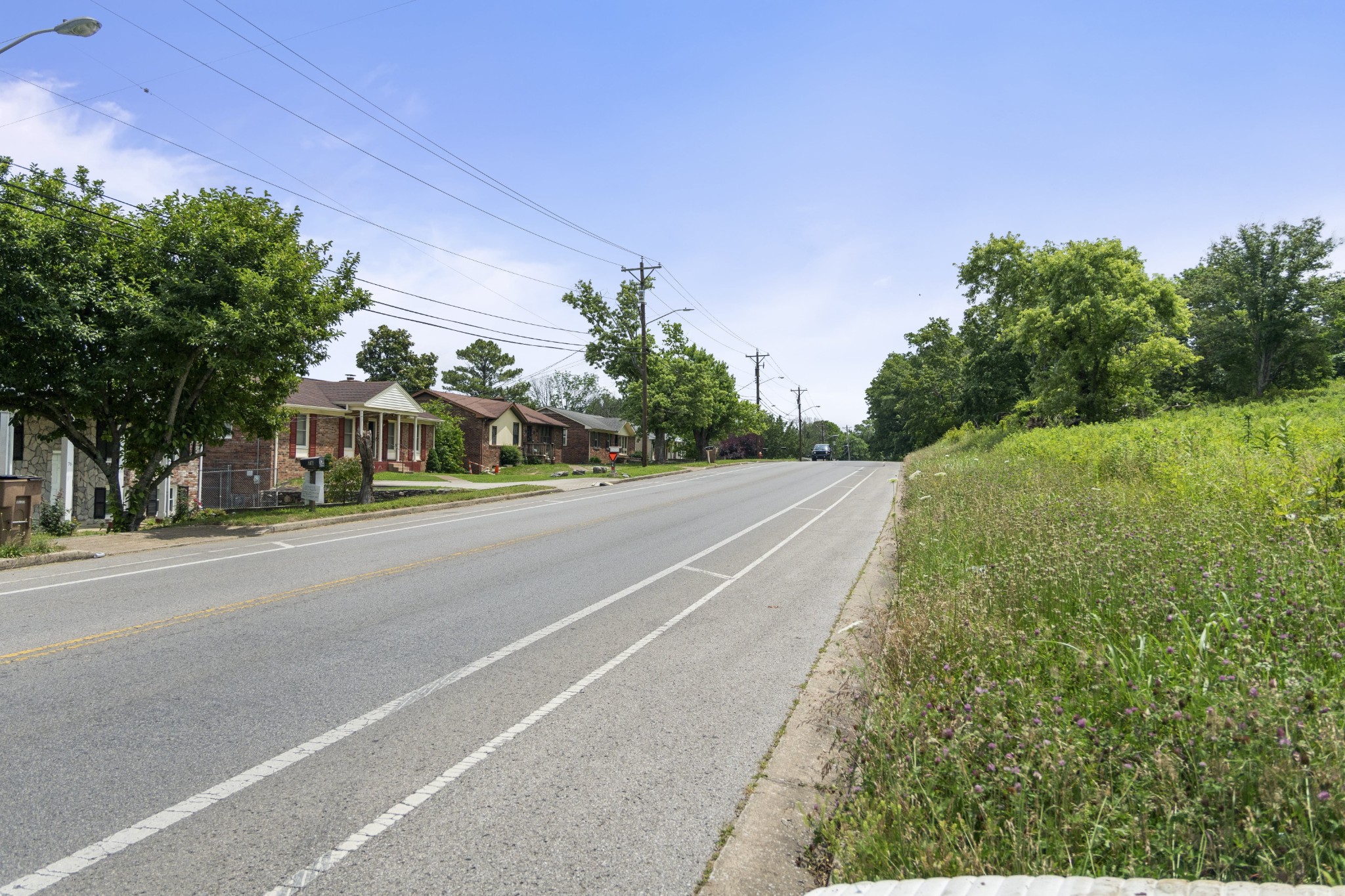 73 Tusculum Road Antioch, TN 37013 - Photo 9 of 11 a view of a street with a building in the background