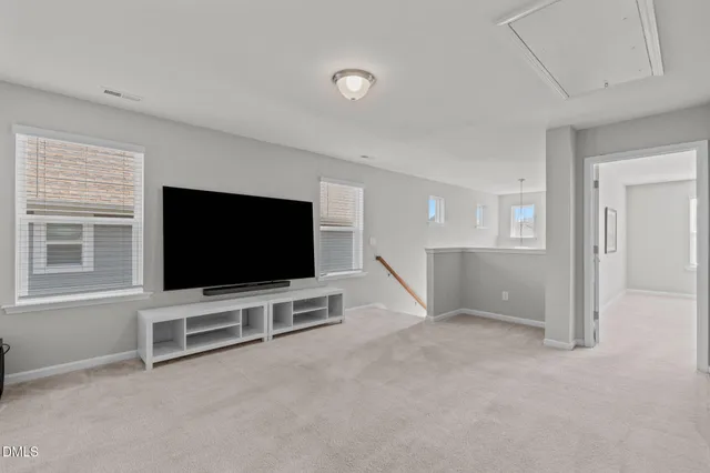 a kitchen with granite countertop a sink and a fireplace