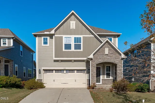 a view of a backyard with potted plants