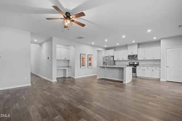 an aerial view of a house with a garden