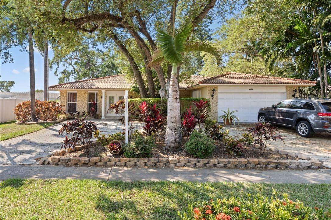 3800 North Park Road Hollywood, FL 33021 - Photo 1 of 27 a front view of a house with garden