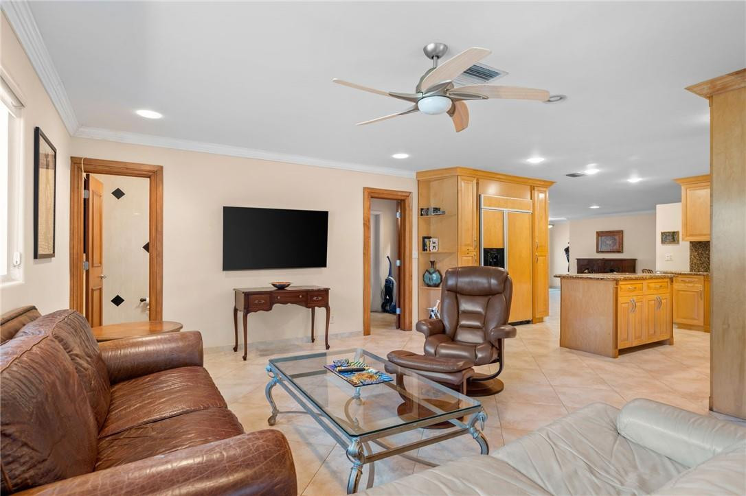 3800 North Park Road Hollywood, FL 33021 - Photo 12 of 27 a living room with furniture kitchen view and a large window