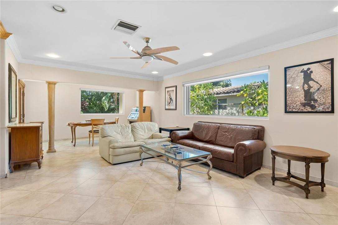 3800 North Park Road Hollywood, FL 33021 - Photo 13 of 27 a living room with furniture and a large window