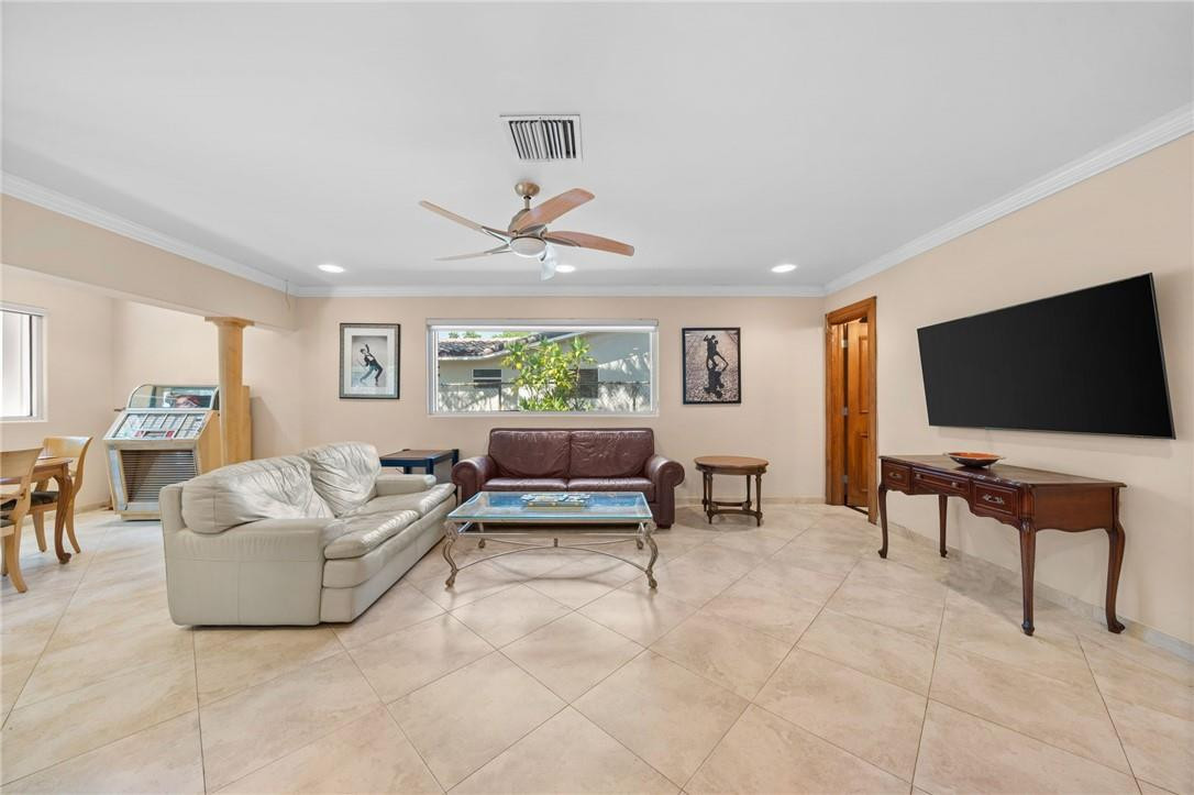 3800 North Park Road Hollywood, FL 33021 - Photo 14 of 27 a living room with furniture and a flat screen tv