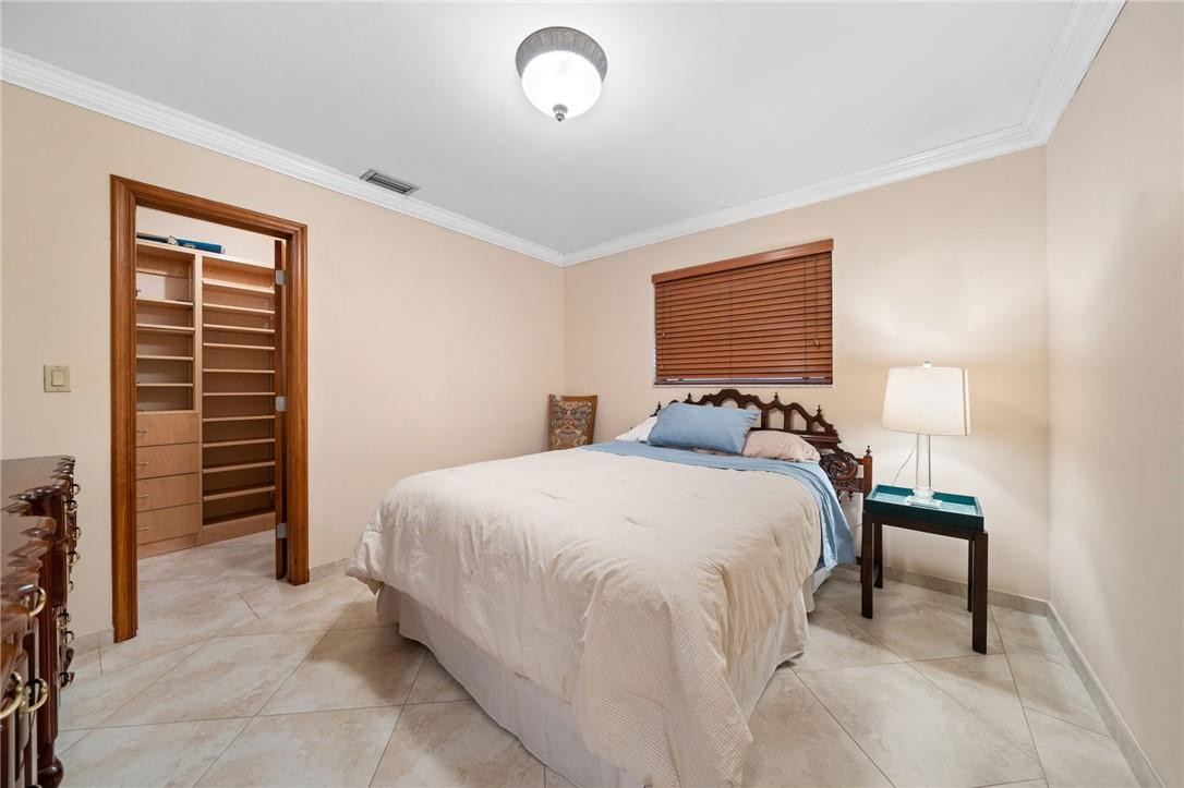 3800 North Park Road Hollywood, FL 33021 - Photo 18 of 27 a bed room with a bed and a television