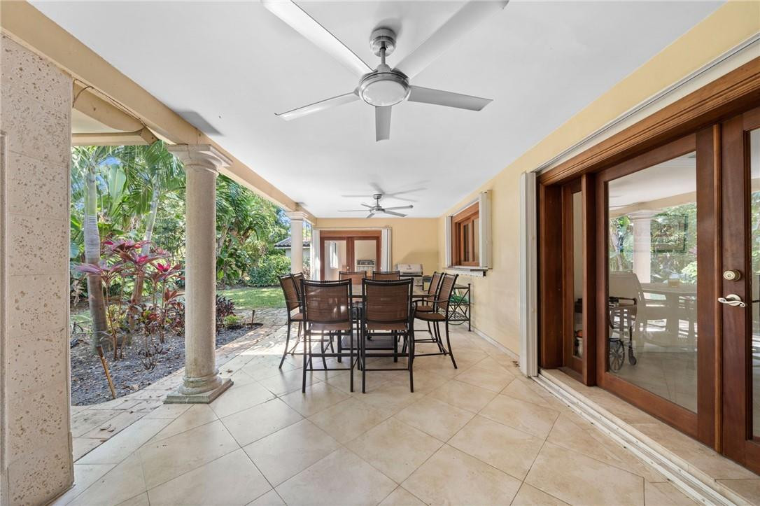 3800 North Park Road Hollywood, FL 33021 - Photo 25 of 27 a dining room with furniture and a floor to ceiling window