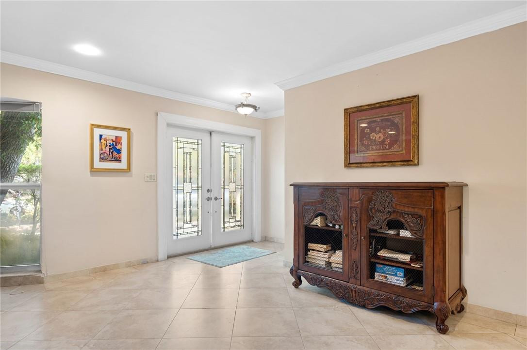 3800 North Park Road Hollywood, FL 33021 - Photo 3 of 27 a living room with furniture and a fireplace
