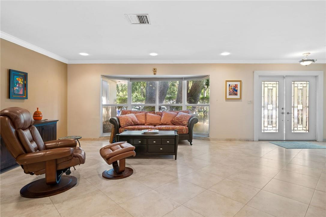 3800 North Park Road Hollywood, FL 33021 - Photo 4 of 27 a living room with furniture and a window
