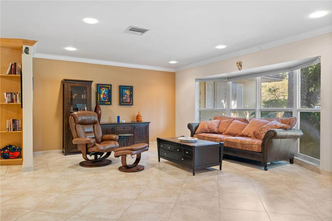 3800 North Park Road Hollywood, FL 33021 - Photo 6 of 27 a living room with furniture and a large window