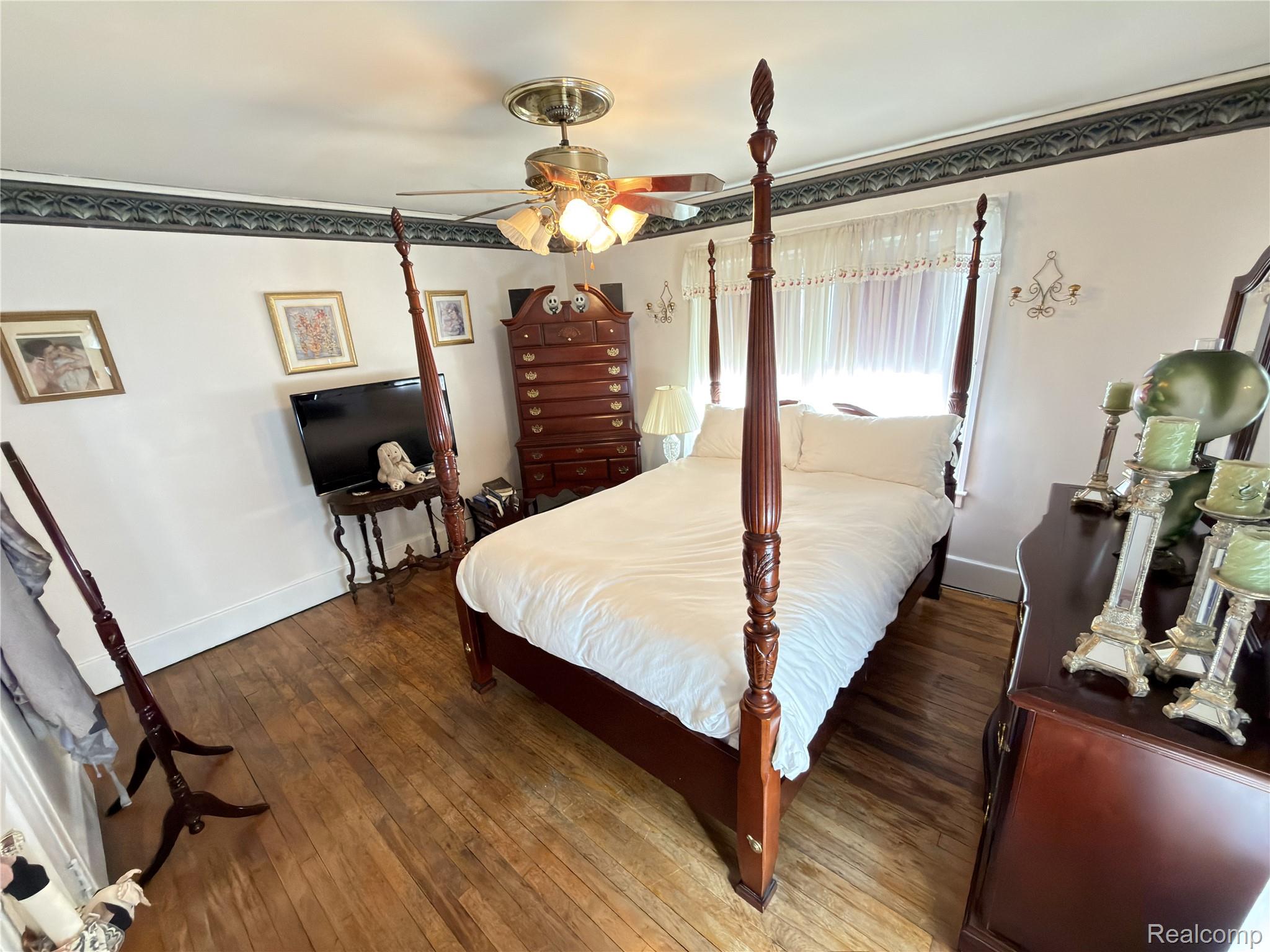 52 Maple Street River Rouge, MI 48218 - Photo 19 of 28 Bedroom featuring wood-type flooring and ceiling fan
