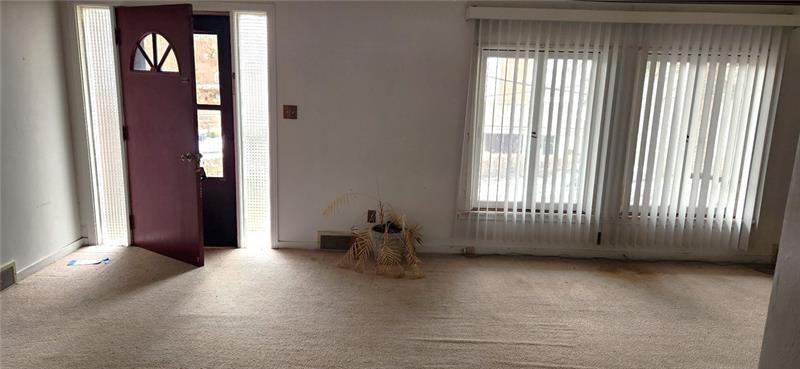 25 Kay Street Uniontown, PA 15401 - Photo 2 of 9 an empty room with windows
