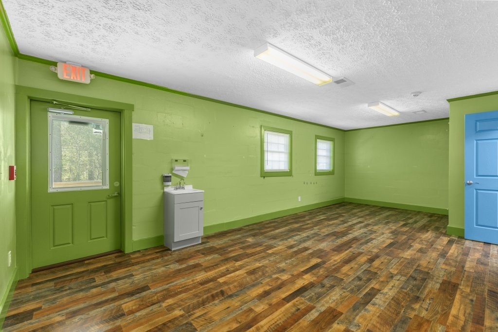 427 South Fair Street Morrison, TN 37357 - Photo 13 of 29 a view of an empty room with window and wooden floor