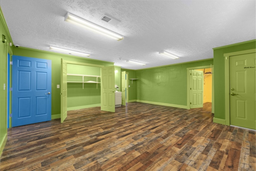427 South Fair Street Morrison, TN 37357 - Photo 15 of 29 a view of a big room with wooden floor and windows