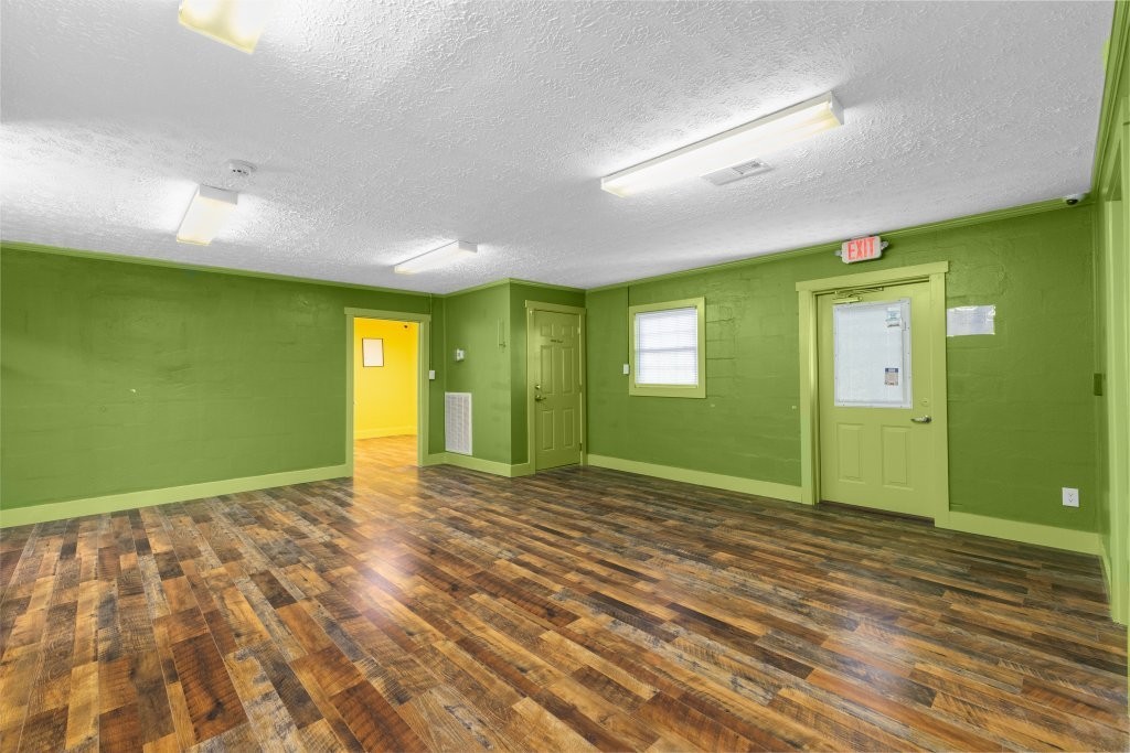 427 South Fair Street Morrison, TN 37357 - Photo 16 of 29 a view of an empty room with window and wooden floor