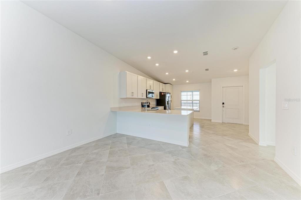 19015 Scallop Loop, Unit 7121 Lakewood Ranch, FL 34211 - Photo 16 of 48 a view of kitchen and kitchen with sink
