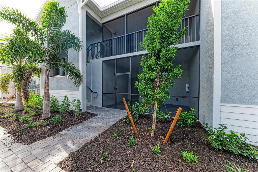 19015 Scallop Loop, Unit 7121 Lakewood Ranch, FL 34211 - Photo 3 of 48 a house view with a backyard space