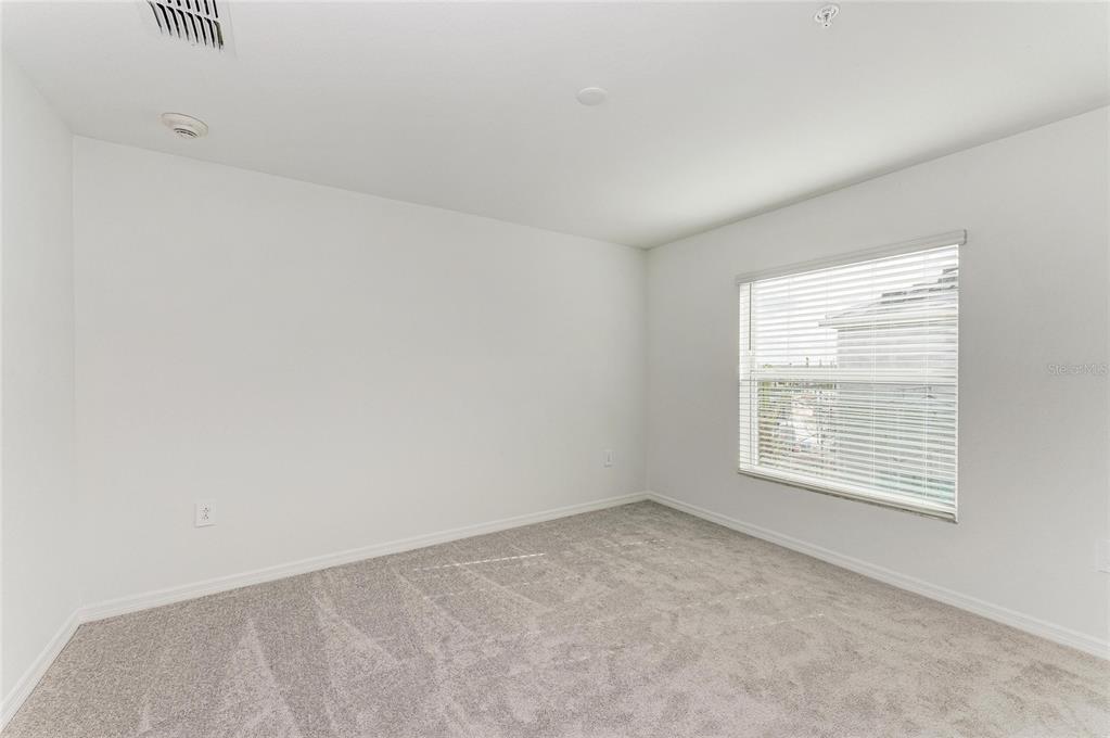 19015 Scallop Loop, Unit 7121 Lakewood Ranch, FL 34211 - Photo 36 of 48 an empty room with a window