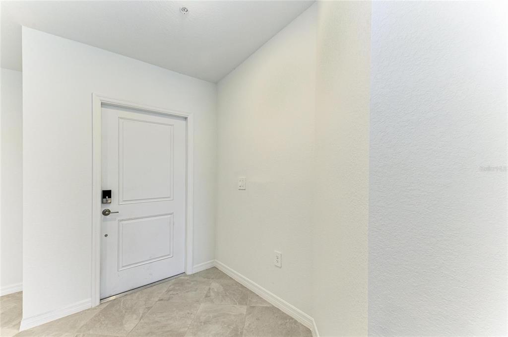 19015 Scallop Loop, Unit 7121 Lakewood Ranch, FL 34211 - Photo 9 of 48 a view of an empty room