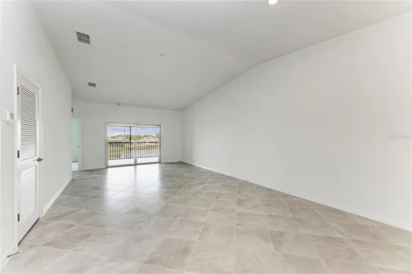 a view of an empty room and window