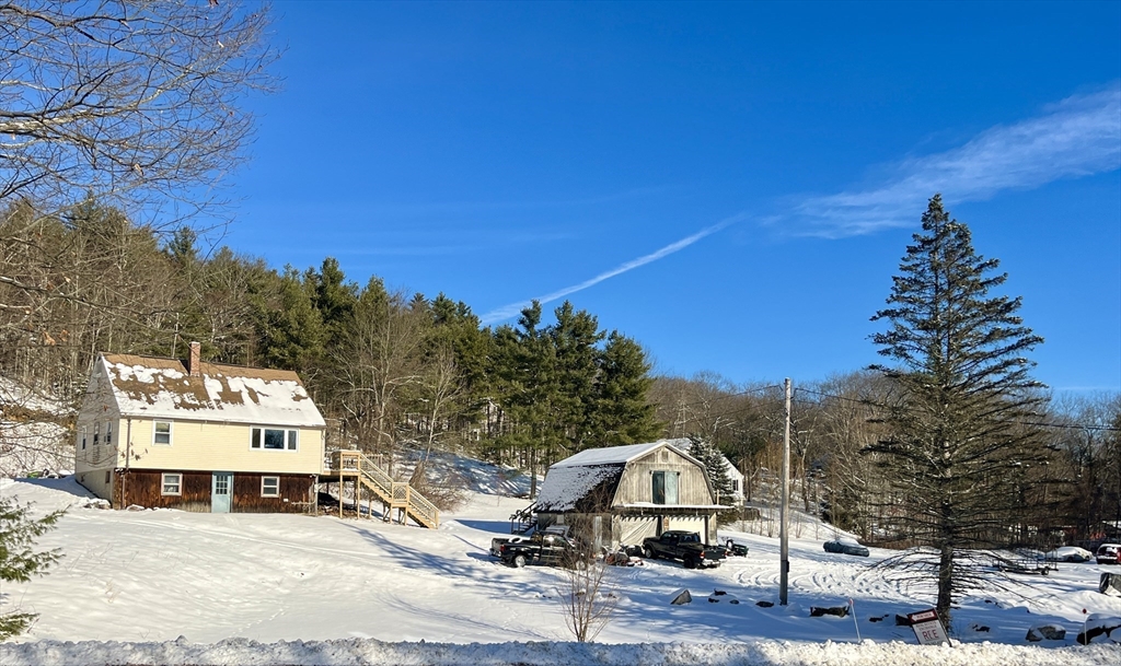 44 Rindge State Road Ashburnham, MA 01430 - Photo 3 of 10 a view of a house with a street