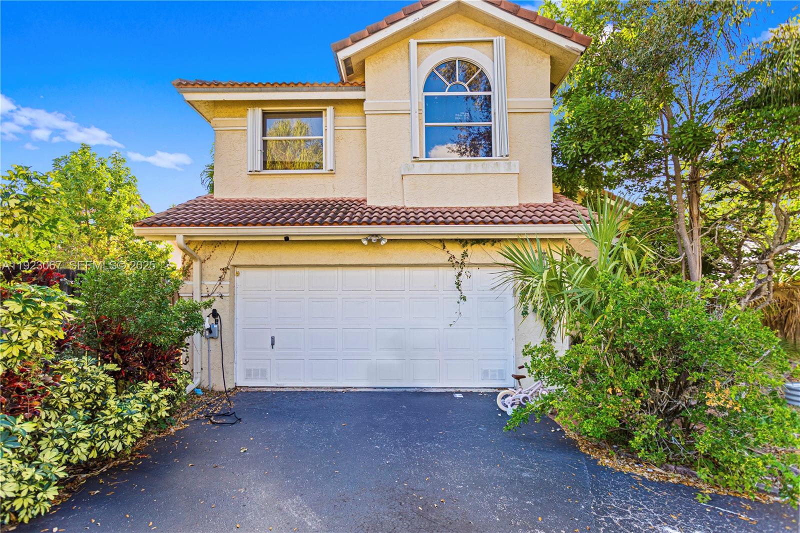 a view of a house with a swimming pool