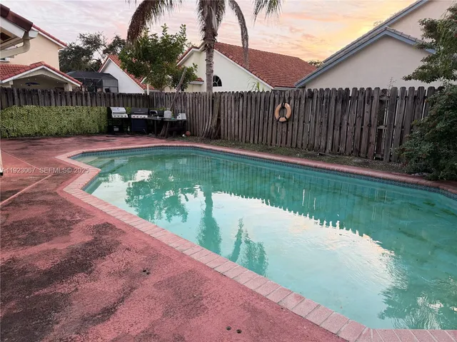 a view of a patio with a yard