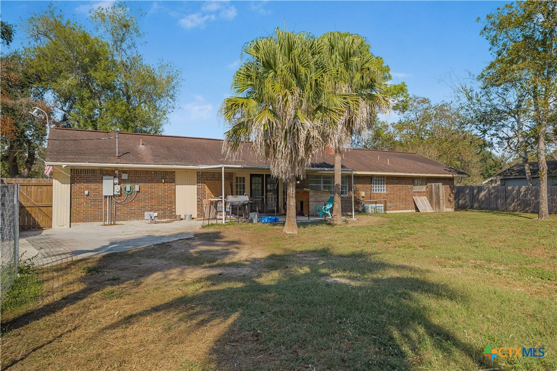 204 Brooks Road Victoria, TX 77904 - Photo 19 of 22 a front view of a house with a yard and garage