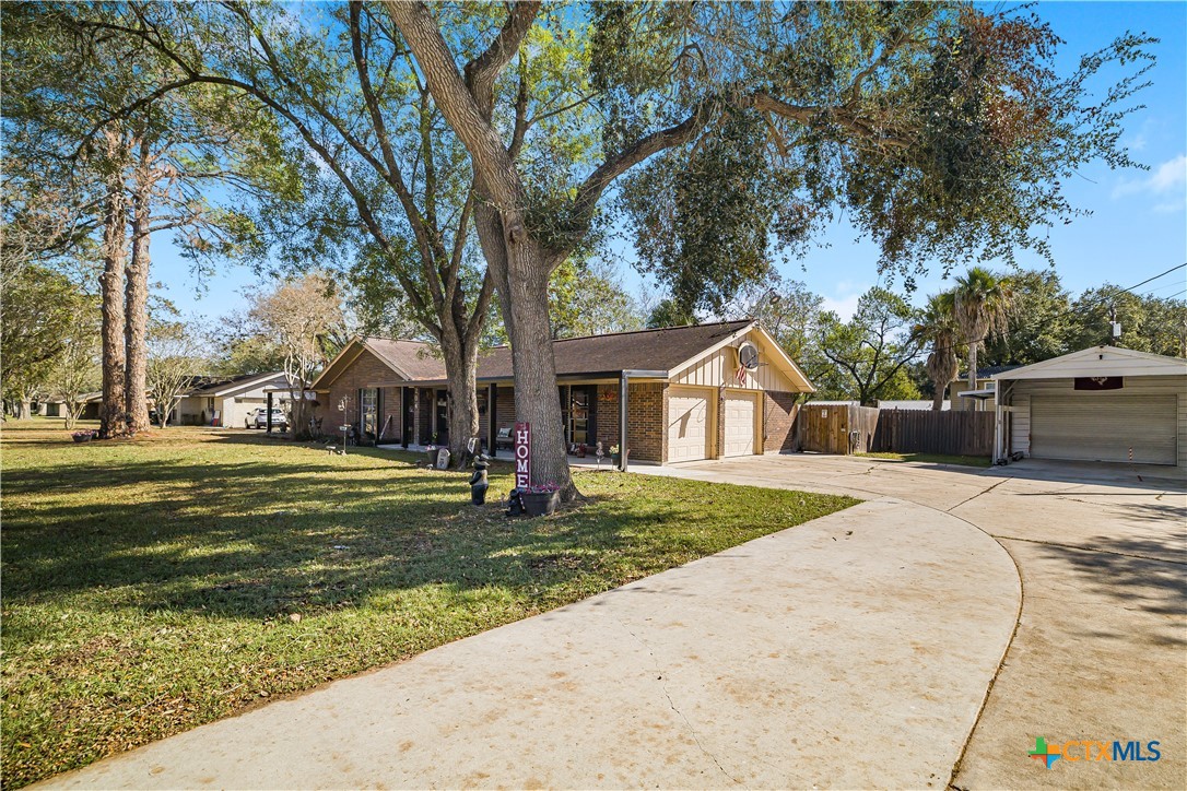 204 Brooks Road Victoria, TX 77904 - Photo 2 of 22 a front view of a house with a yard and trees
