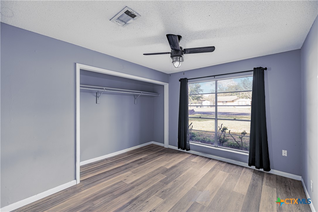 204 Brooks Road Victoria, TX 77904 - Photo 10 of 22 a view of room window and wooden floor