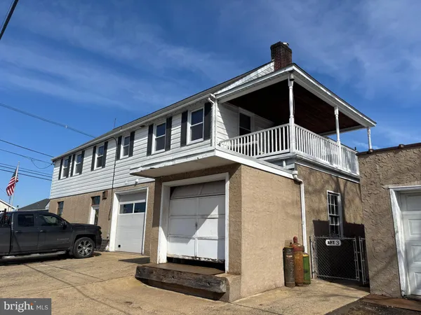 a front view of a house with glass door