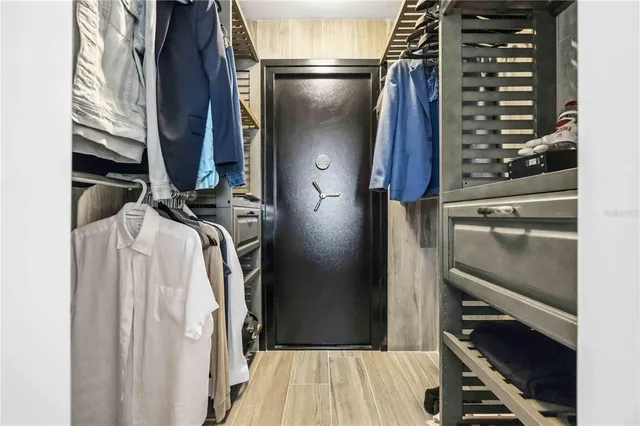 a bathroom with a toilet a sink and shower