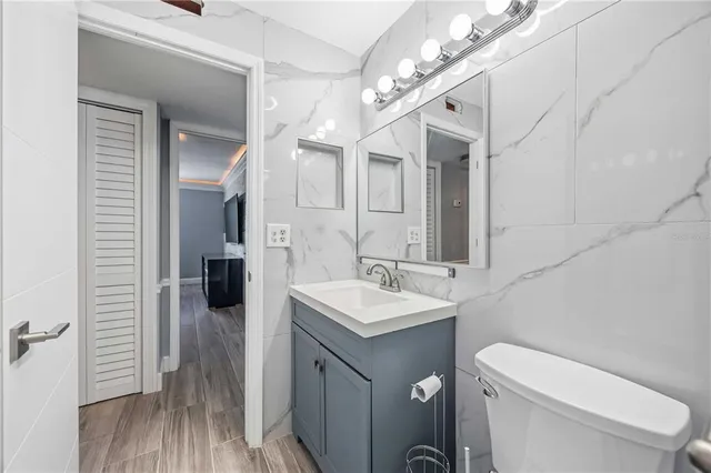 a view of residential houses with yard and swimming pool