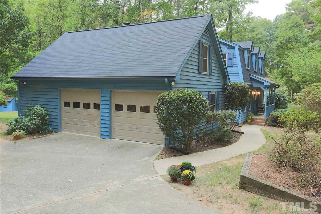 113 Trotters Ridge Drive Raleigh, NC 27614 - Photo 6 of 25 Oversized Garage with space for a Work Bench.